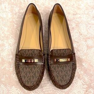 Brand New Michael Kors Brown Loafers Slip On Flats w/ Gold Tone Metal Logo Bar